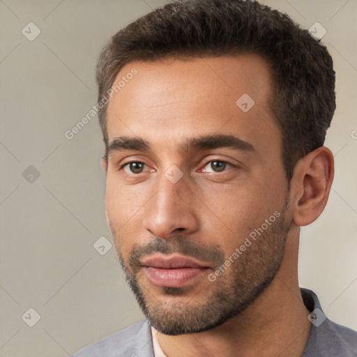 Neutral white young-adult male with short  brown hair and brown eyes