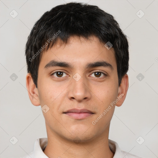 Neutral latino young-adult male with short  black hair and brown eyes