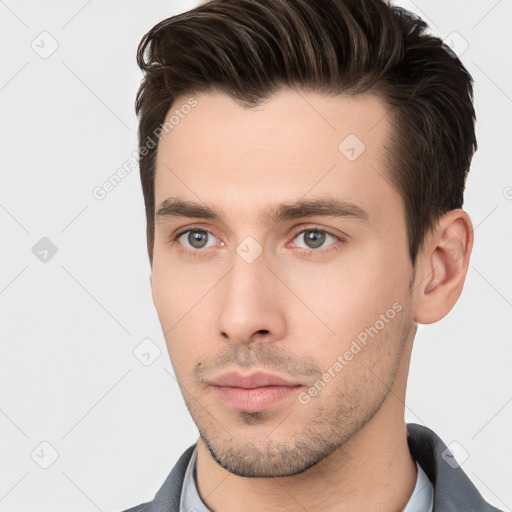 Neutral white young-adult male with short  brown hair and brown eyes