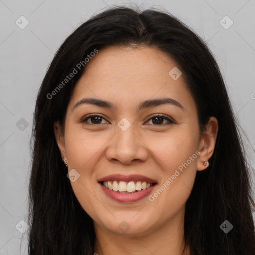 Joyful asian young-adult female with long  brown hair and brown eyes