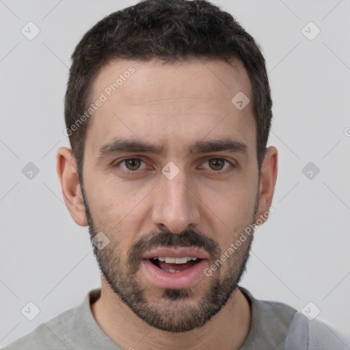 Joyful white young-adult male with short  brown hair and brown eyes