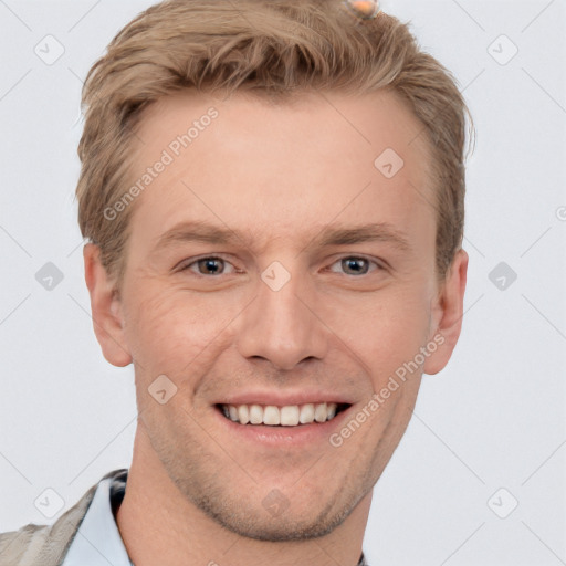 Joyful white adult male with short  brown hair and grey eyes