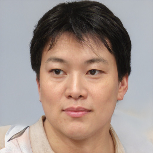 Neutral asian young-adult male with short  brown hair and brown eyes