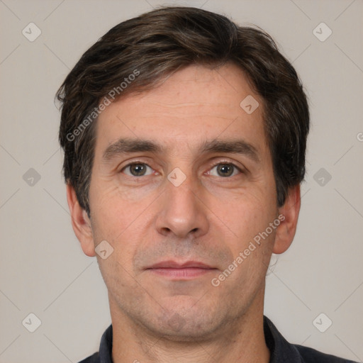 Neutral white adult male with short  brown hair and brown eyes