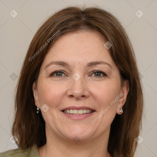 Joyful white adult female with medium  brown hair and grey eyes