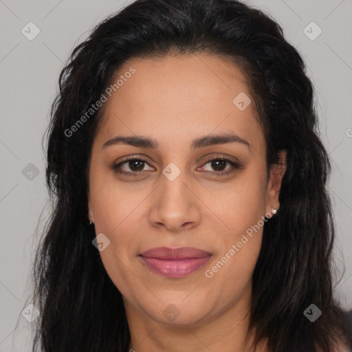 Joyful latino young-adult female with long  brown hair and brown eyes