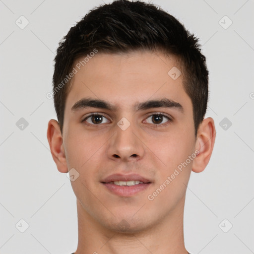 Joyful white young-adult male with short  brown hair and brown eyes