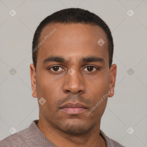 Neutral latino young-adult male with short  black hair and brown eyes