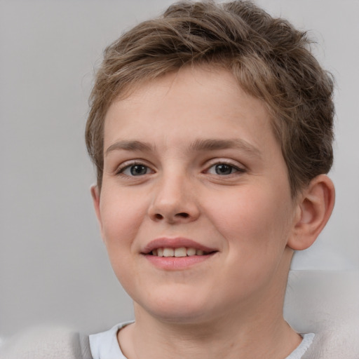 Joyful white child female with short  brown hair and grey eyes