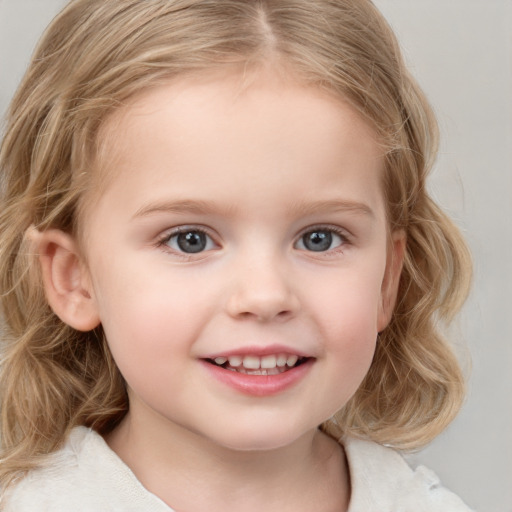 Joyful white child female with medium  brown hair and grey eyes