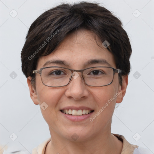 Joyful white adult female with short  brown hair and brown eyes