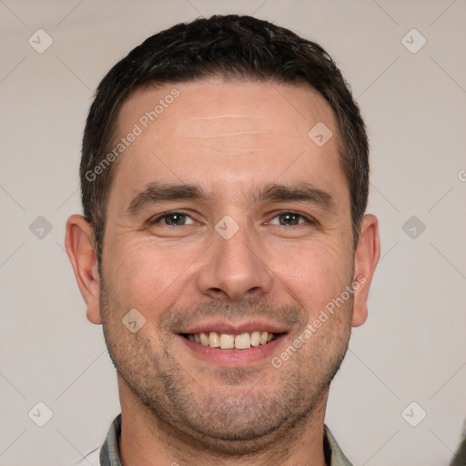 Joyful white young-adult male with short  brown hair and brown eyes