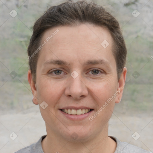 Joyful white adult female with short  brown hair and brown eyes