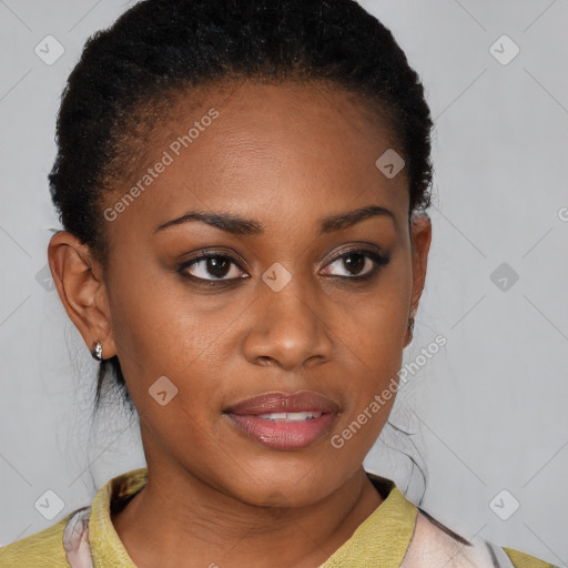 Joyful black young-adult female with short  brown hair and brown eyes