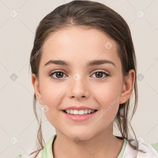 Joyful white child female with medium  brown hair and brown eyes