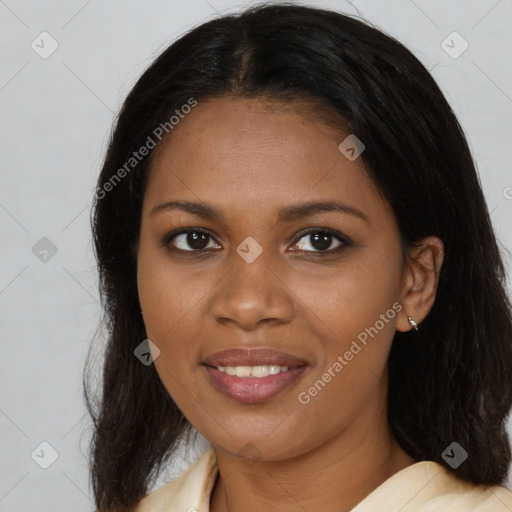 Joyful black young-adult female with medium  brown hair and brown eyes