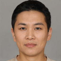 Neutral asian young-adult male with short  black hair and brown eyes