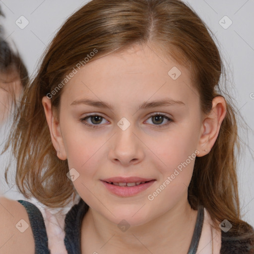 Joyful white child female with medium  brown hair and brown eyes