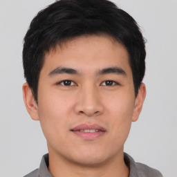 Neutral asian young-adult male with short  brown hair and brown eyes