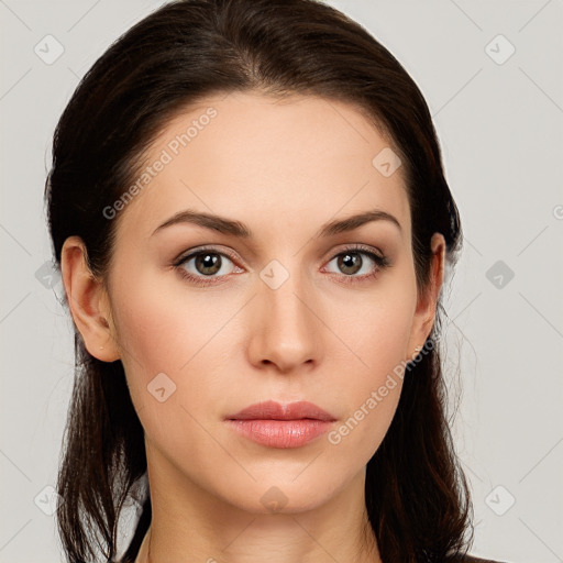 Neutral white young-adult female with long  brown hair and brown eyes