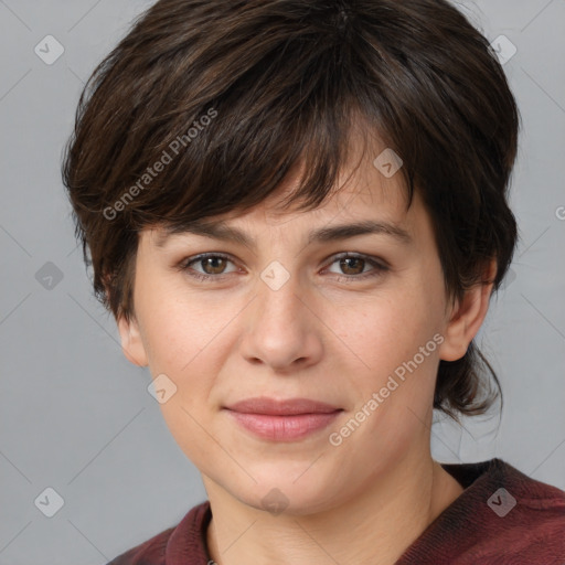 Joyful white young-adult female with medium  brown hair and grey eyes