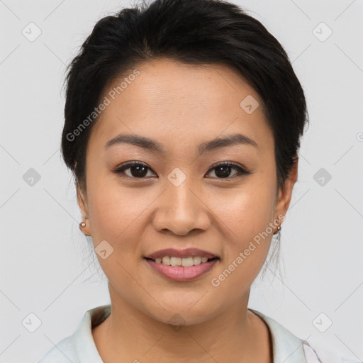 Joyful asian young-adult female with short  brown hair and brown eyes