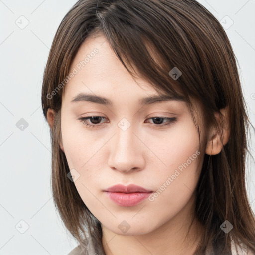 Neutral white young-adult female with long  brown hair and brown eyes