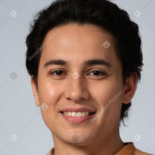 Joyful white young-adult male with short  black hair and brown eyes