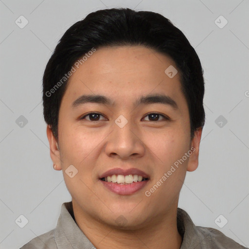 Joyful asian young-adult male with short  black hair and brown eyes