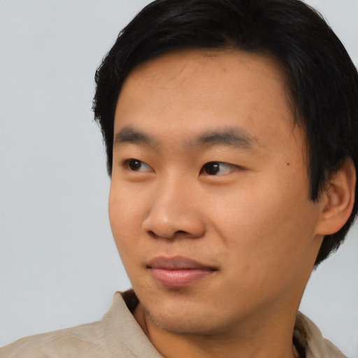 Neutral asian young-adult male with short  black hair and brown eyes