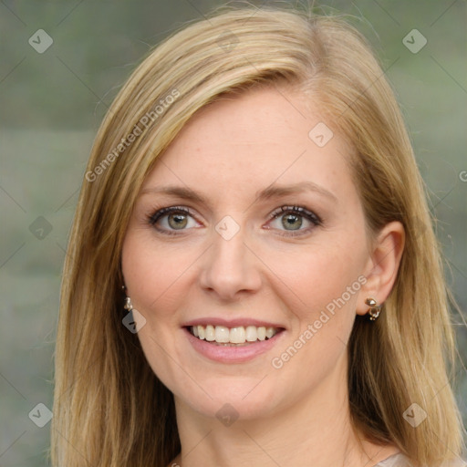 Joyful white young-adult female with medium  brown hair and green eyes