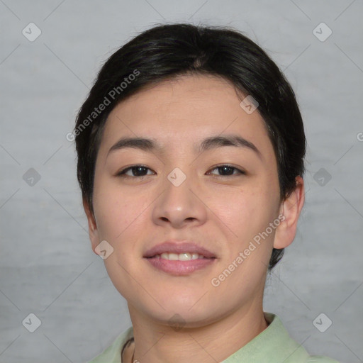 Joyful asian young-adult female with short  brown hair and brown eyes