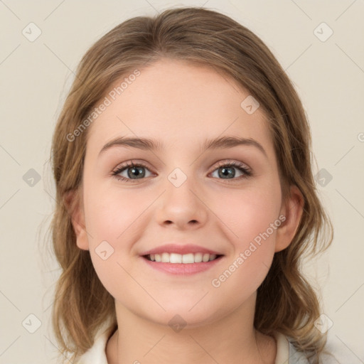 Joyful white child female with medium  brown hair and brown eyes