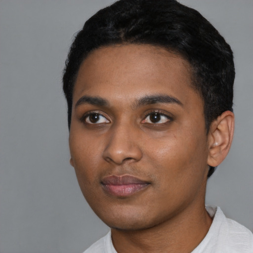 Neutral black young-adult male with short  black hair and brown eyes