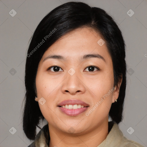 Joyful asian young-adult female with medium  black hair and brown eyes