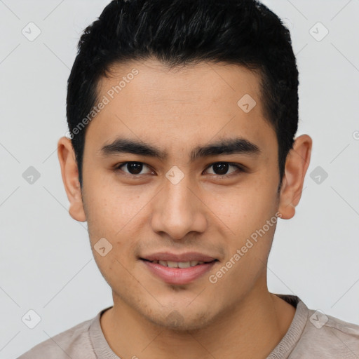 Joyful latino young-adult male with short  black hair and brown eyes