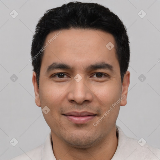 Joyful latino young-adult male with short  black hair and brown eyes