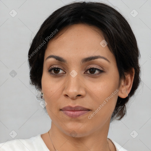 Joyful asian young-adult female with medium  black hair and brown eyes