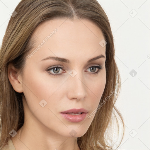 Neutral white young-adult female with long  brown hair and brown eyes