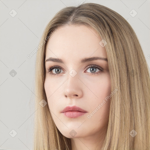 Neutral white young-adult female with long  brown hair and brown eyes