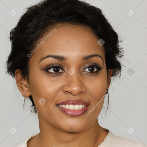 Joyful black young-adult female with medium  brown hair and brown eyes