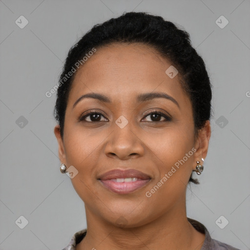 Joyful latino young-adult female with short  brown hair and brown eyes