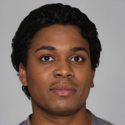 Neutral black young-adult female with short  black hair and brown eyes
