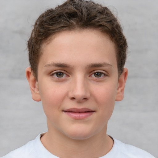 Joyful white child female with short  brown hair and brown eyes