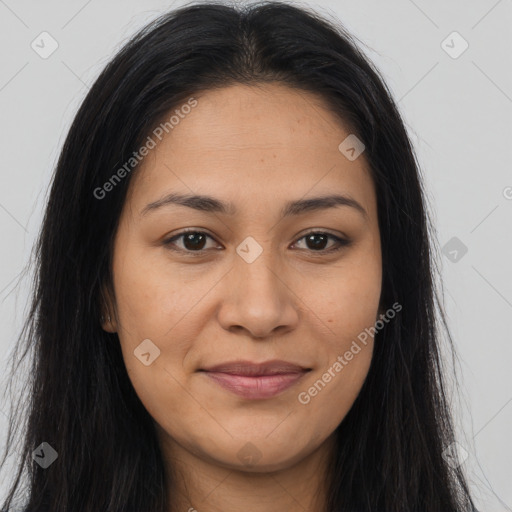 Joyful latino young-adult female with long  brown hair and brown eyes