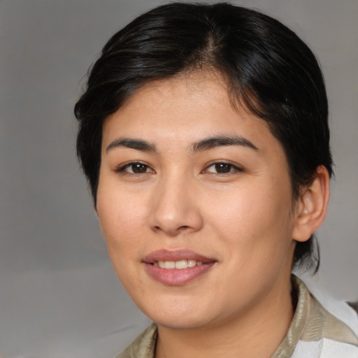 Joyful asian young-adult female with medium  brown hair and brown eyes