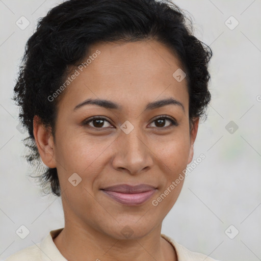 Joyful latino young-adult female with short  brown hair and brown eyes