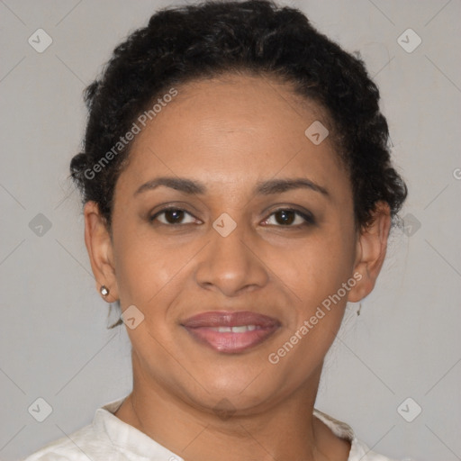 Joyful latino young-adult female with short  brown hair and brown eyes