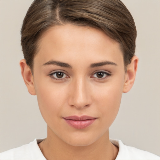 Joyful white young-adult female with short  brown hair and brown eyes