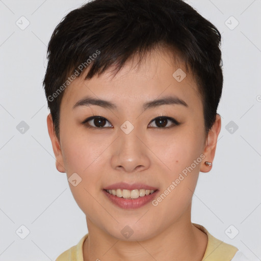 Joyful asian young-adult female with short  brown hair and brown eyes